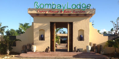 Bombay lodge is now in 2 locations, near Deanaru bridge and upstairs from Cardo's